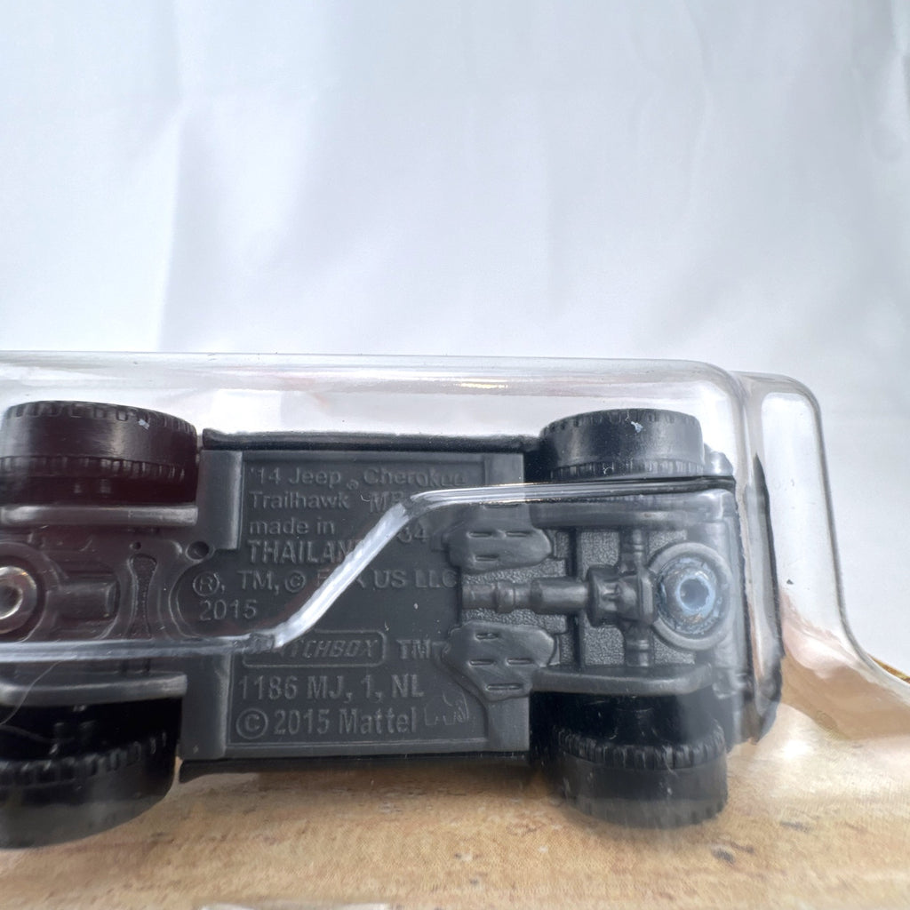 Matchbox 2014 Jeep Cherokee Trailhawk light blue 1:64 scale diecast model car sealed on original card