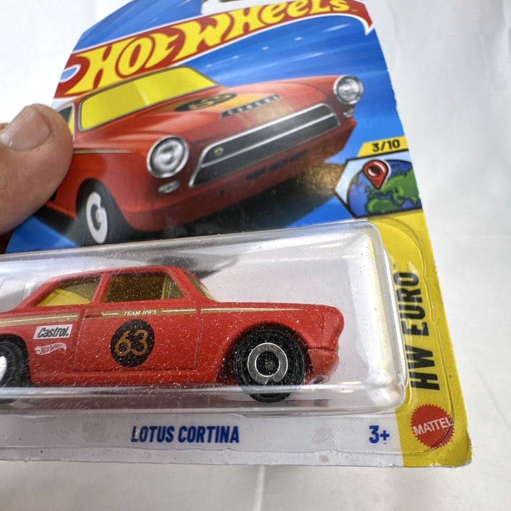 Hot Wheels Lotus Cortina HW Euro red diecast car in original sealed card packaging featuring Castrol #63 livery