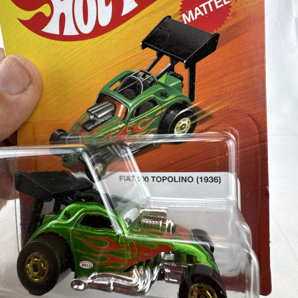 Hot Wheels 1936 Fiat 500 Topolino dragster in metallic green with red flames sealed on card.