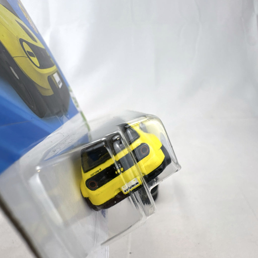 Hot Wheels Custom 2020 Honda e HW EV series diecast car in bright yellow, factory sealed on original cardback