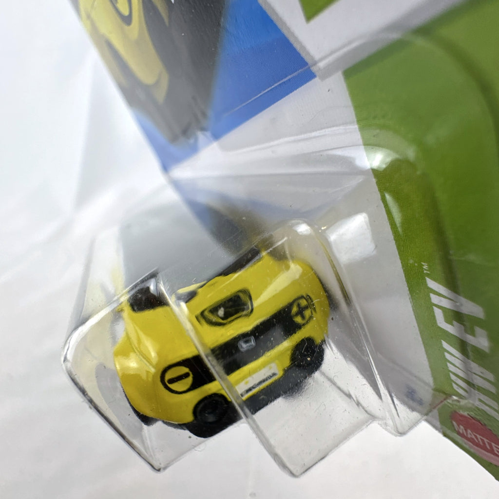 Hot Wheels Custom 2020 Honda e HW EV series diecast car in bright yellow, factory sealed on original cardback