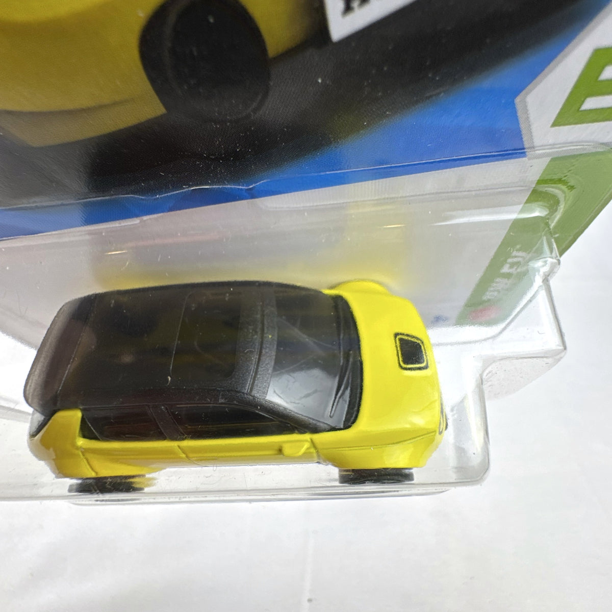 Hot Wheels Custom 2020 Honda e HW EV series diecast car in bright yellow, factory sealed on original cardback