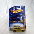 Hot Wheels 2003 35th Anniversary metallic gold Ford Escort Rally diecast car in sealed packaging