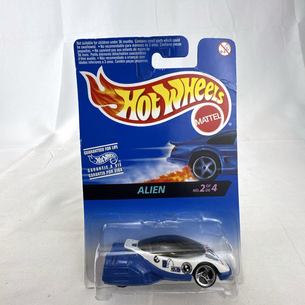 1997 Hot Wheels Alien diecast car in white and blue sealed on Secret Service Series card.
