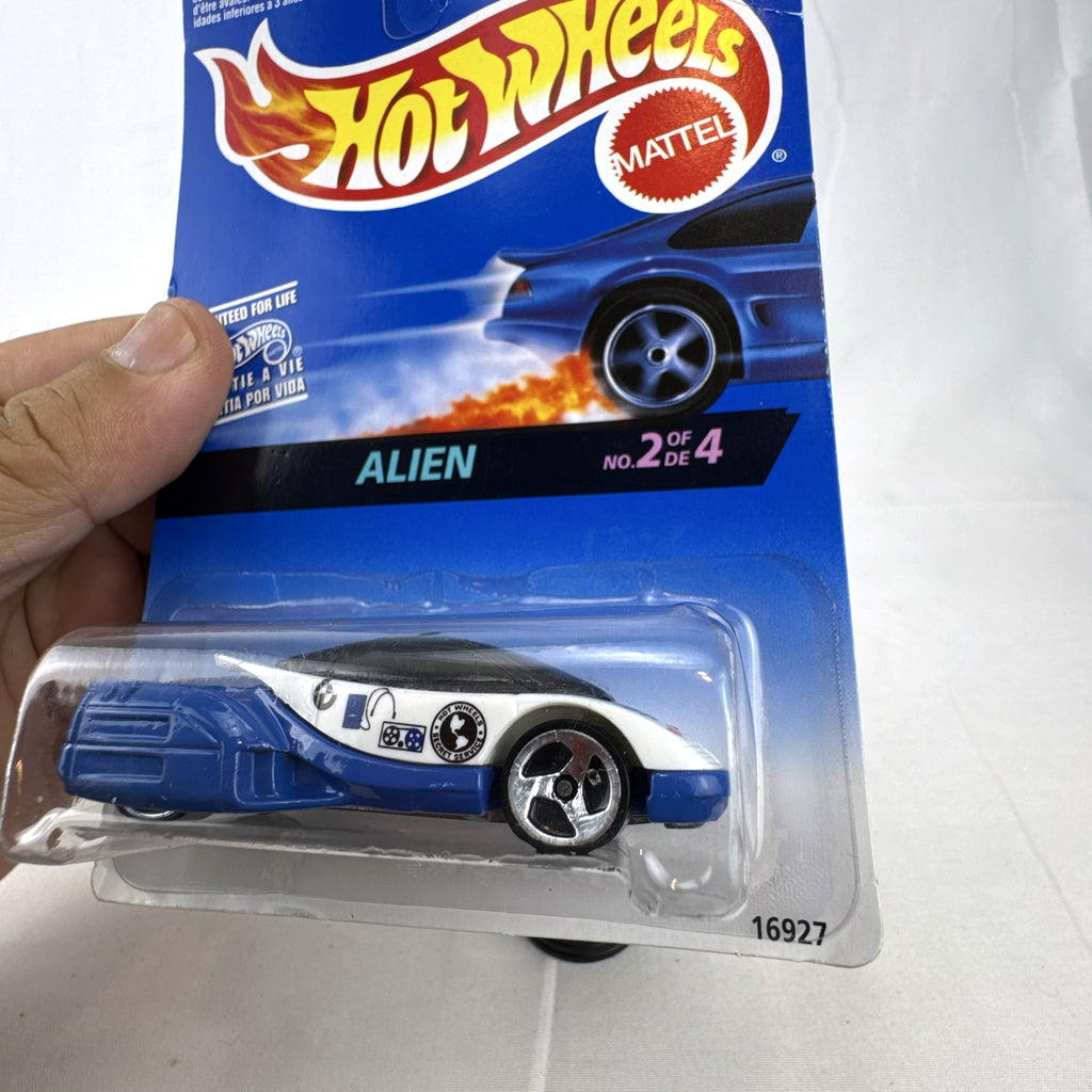 1997 Hot Wheels Alien diecast car in white and blue sealed on Secret Service Series card.