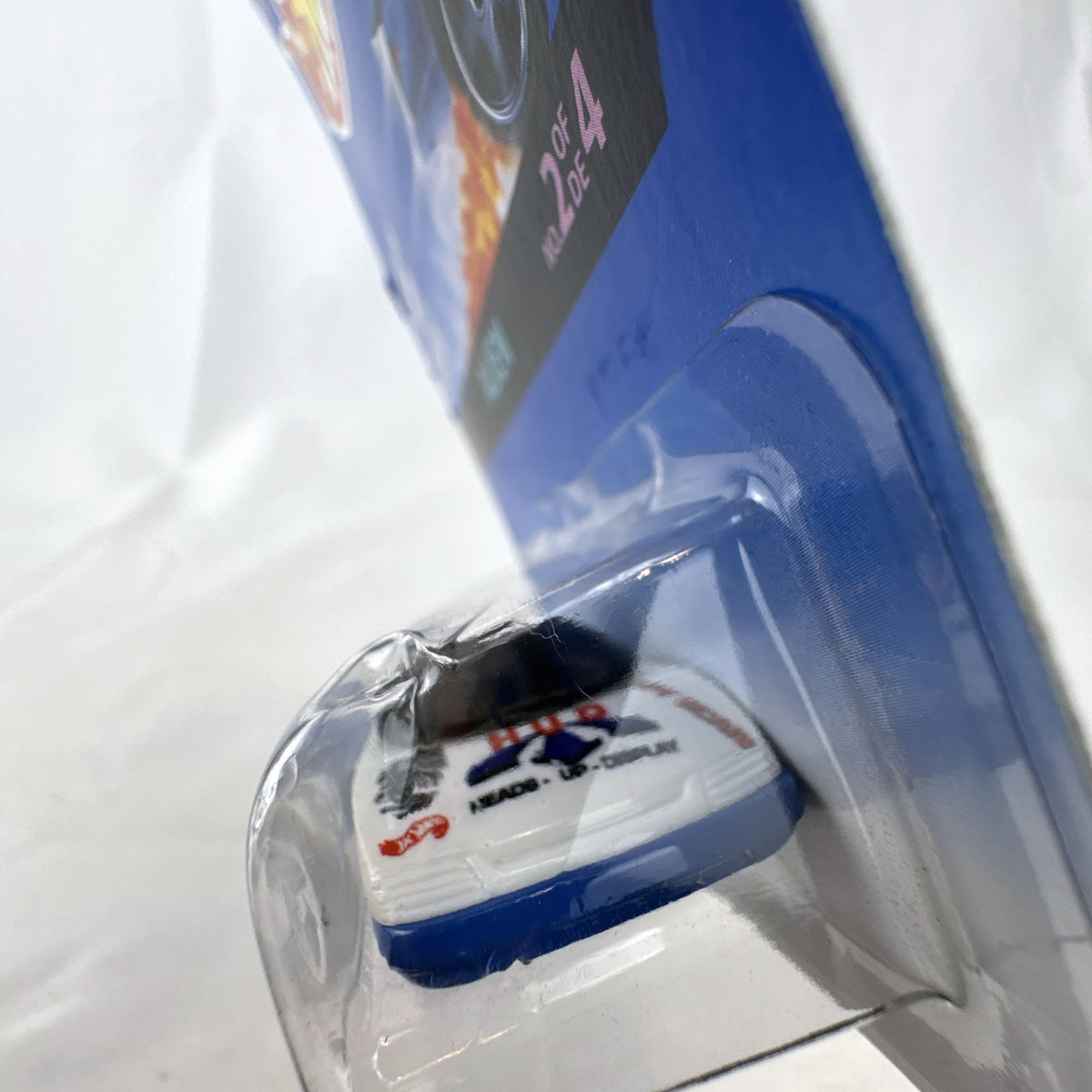 1997 Hot Wheels Alien diecast car in white and blue sealed on Secret Service Series card.