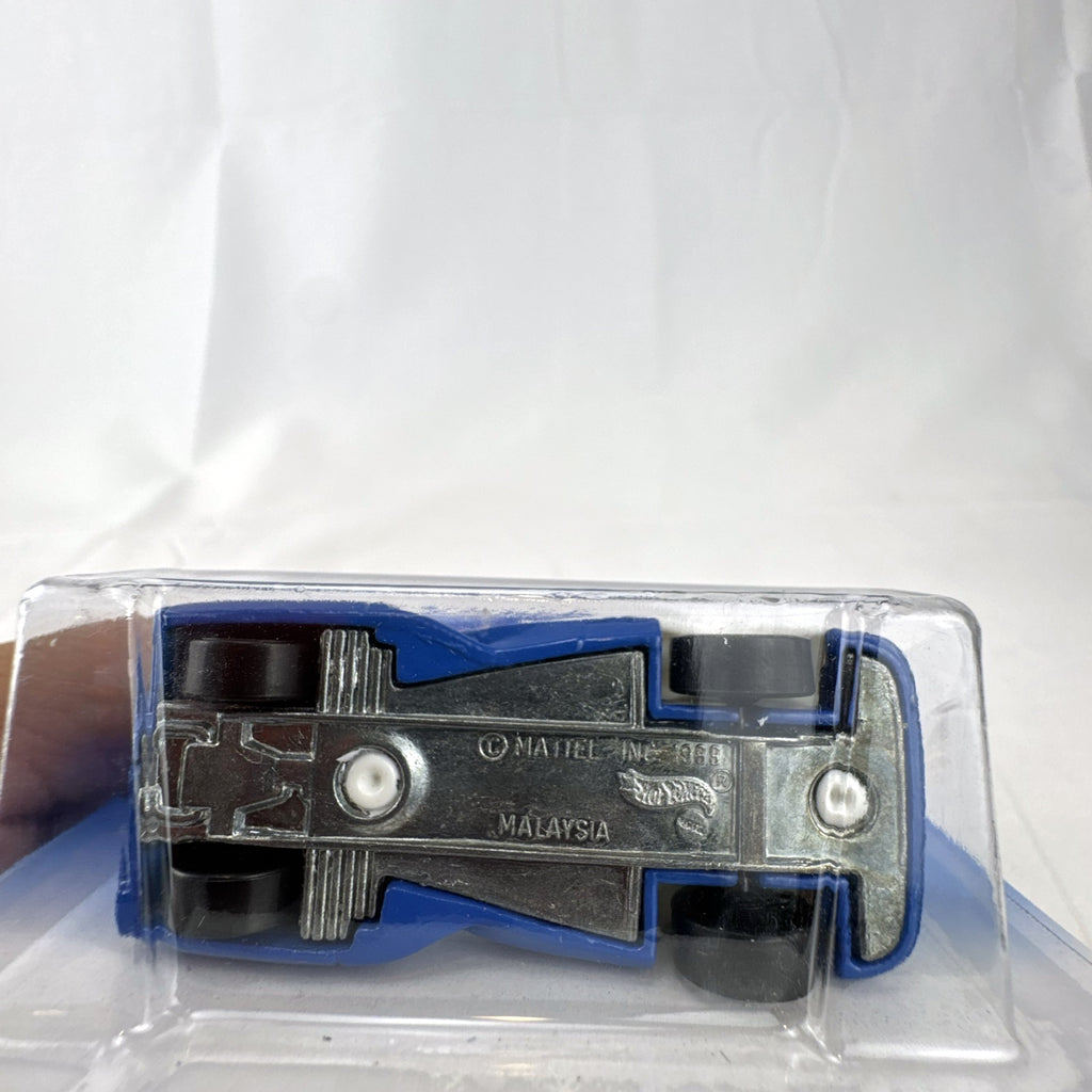 1997 Hot Wheels Alien diecast car in white and blue sealed on Secret Service Series card.