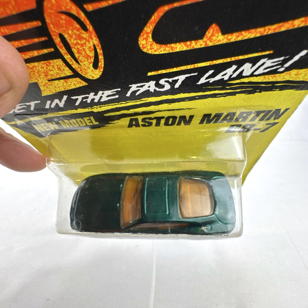 Sealed 1993 Matchbox Super Fast Aston Martin DB-7 diecast car #59 in deep metallic green with original card packaging.
