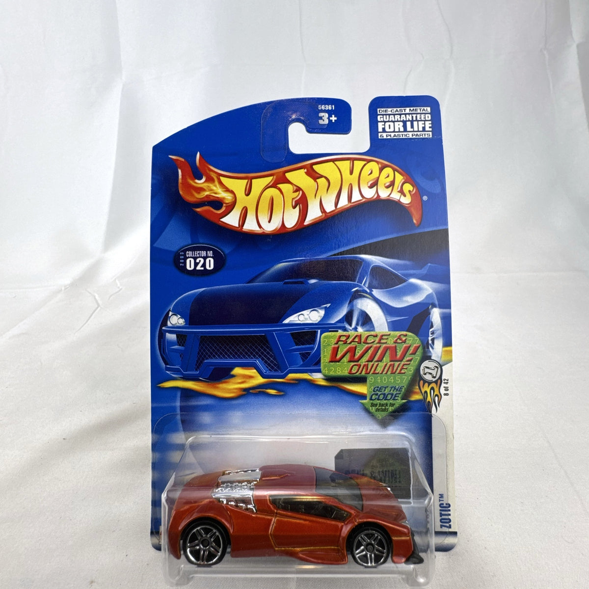 2003 Hot Wheels First Editions Zotic diecast concept car in metallic orange, factory sealed on blister card.