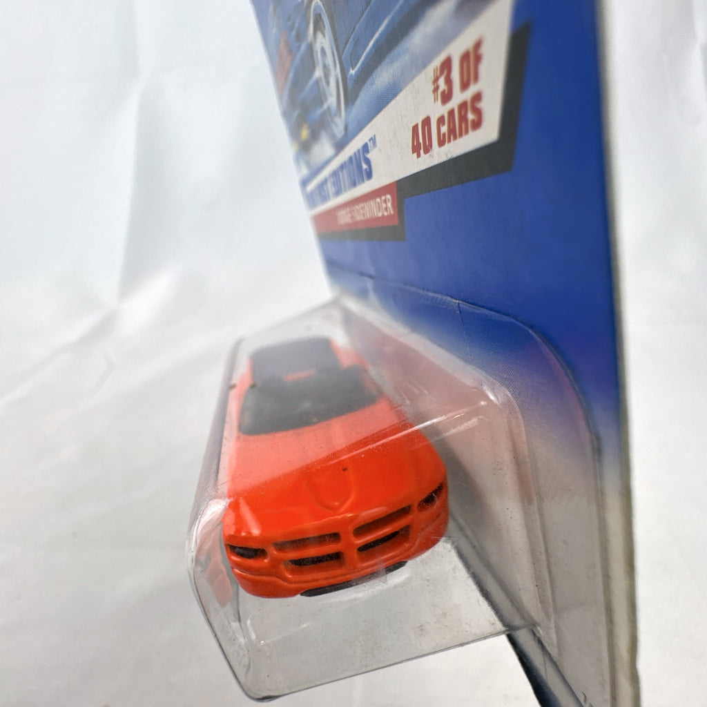 Factory sealed 1998 Hot Wheels First Editions Dodge Sidewinder diecast truck in neon orange on original card.