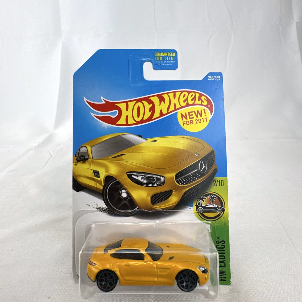 Sealed Hot Wheels 2017 HW Exotics 15 Mercedes-AMG GT diecast car in metallic yellow on original card