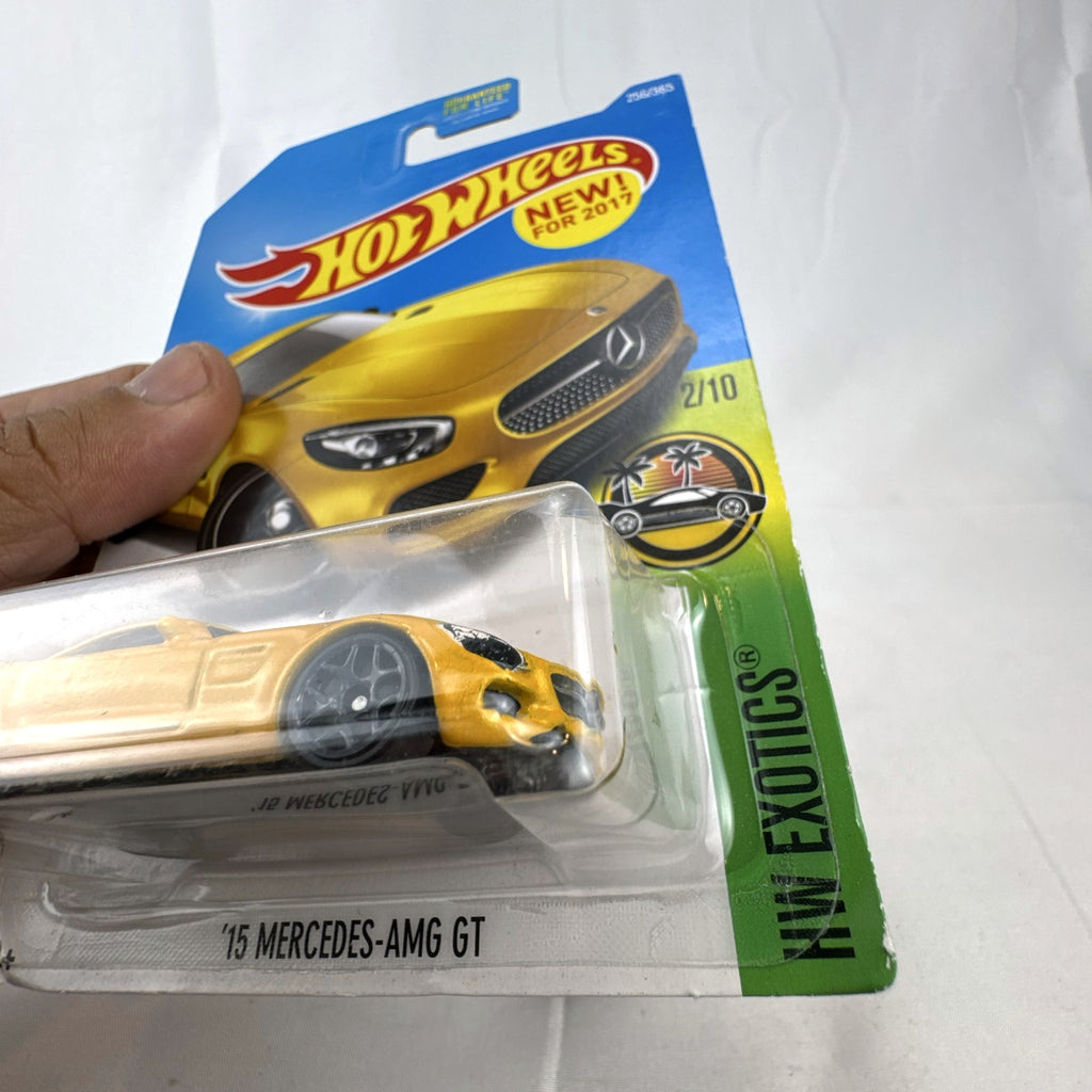 Sealed Hot Wheels 2017 HW Exotics 15 Mercedes-AMG GT diecast car in metallic yellow on original card