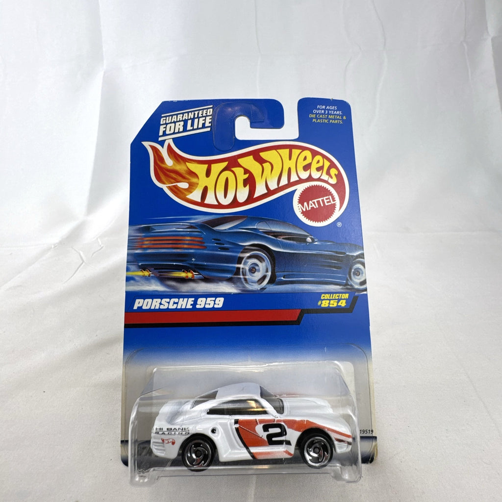 1998 Hot Wheels Porsche 959 diecast car in white Hi Bank Racing livery sealed on original #854 blue card.