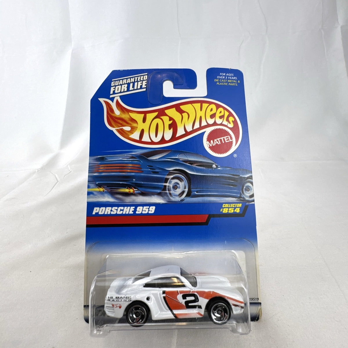 1998 Hot Wheels Porsche 959 diecast car in white Hi Bank Racing livery sealed on original #854 blue card.