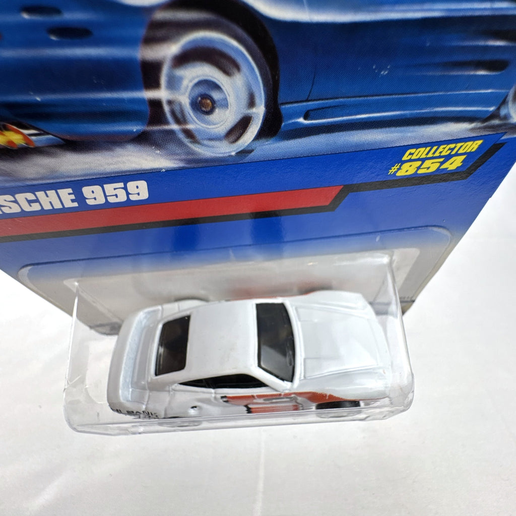 1998 Hot Wheels Porsche 959 diecast car in white Hi Bank Racing livery sealed on original #854 blue card.