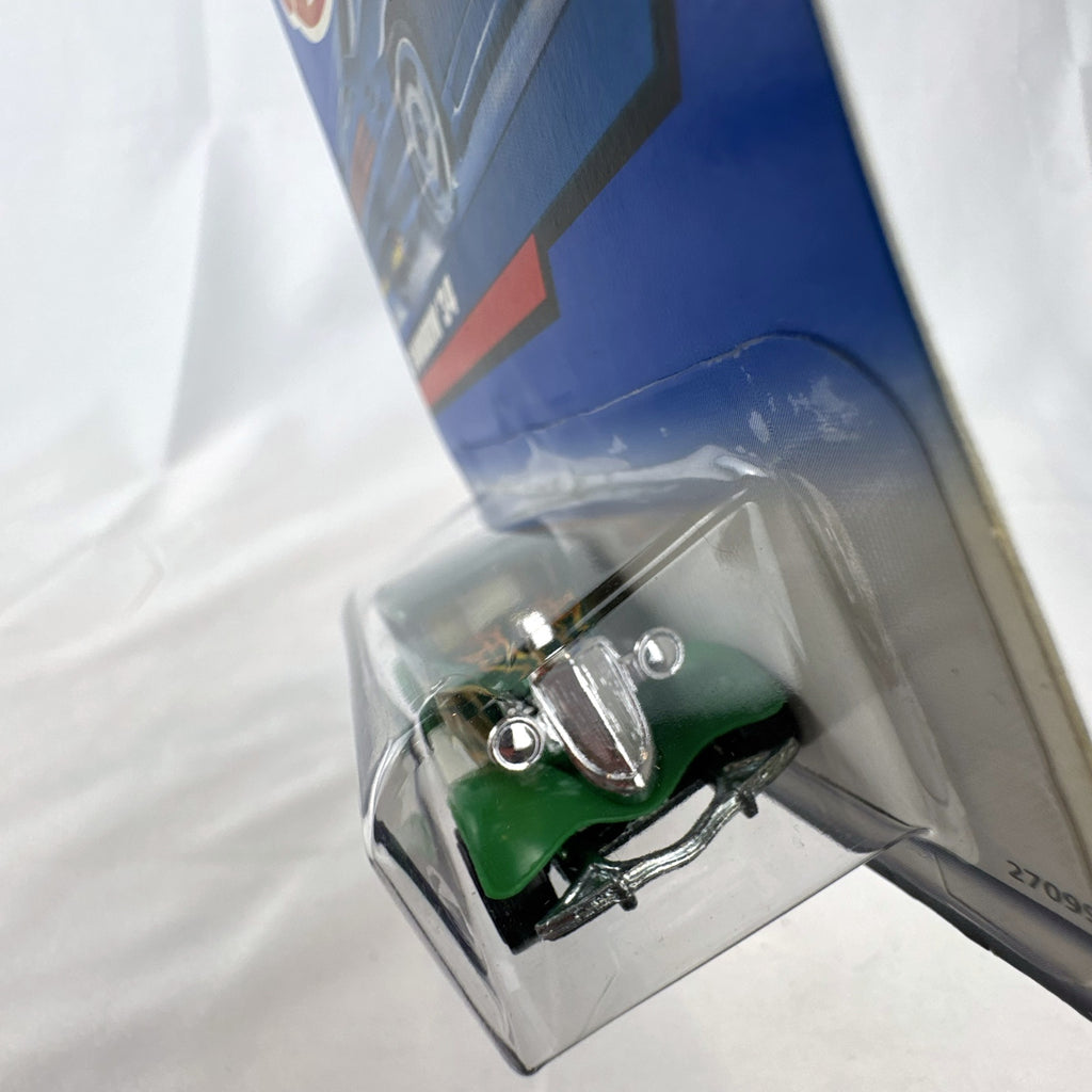 Hot Wheels 2000 Mainline 3-Window '34 Ford Coupe diecast car in metallic green factory sealed on card