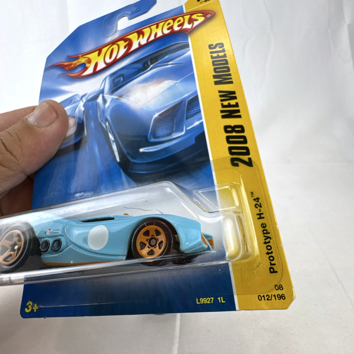 Hot Wheels 2008 Prototype H-24 diecast car in light blue and orange Gulf style livery sealed on card