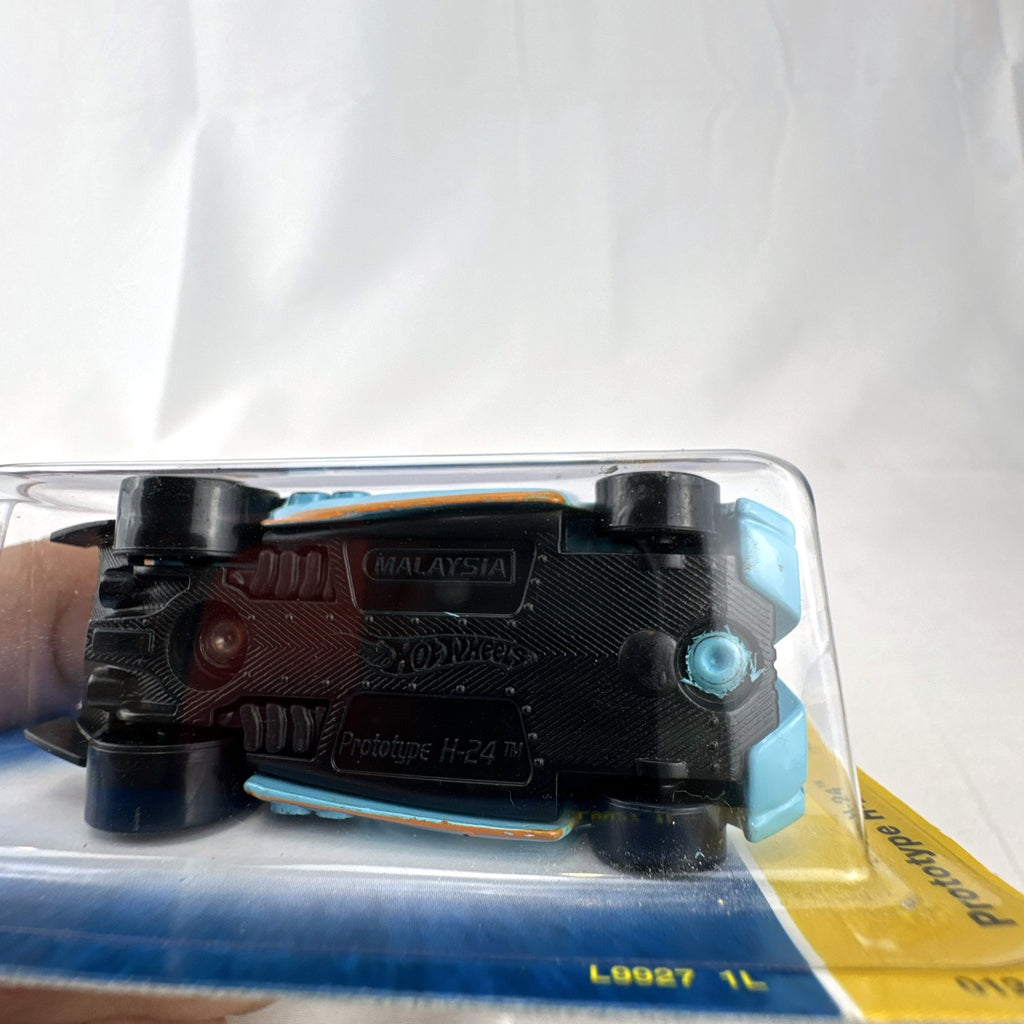 Hot Wheels 2008 Prototype H-24 diecast car in light blue and orange Gulf style livery sealed on card