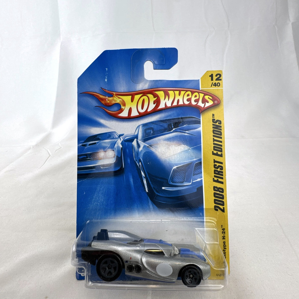 Sealed 2008 Hot Wheels First Editions Prototype H-24 diecast car in silver with blue racing stripes 1:64 scale