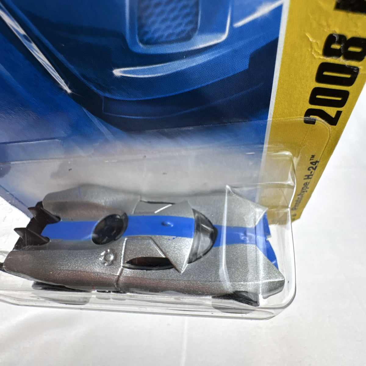Sealed 2008 Hot Wheels First Editions Prototype H-24 diecast car in silver with blue racing stripes 1:64 scale