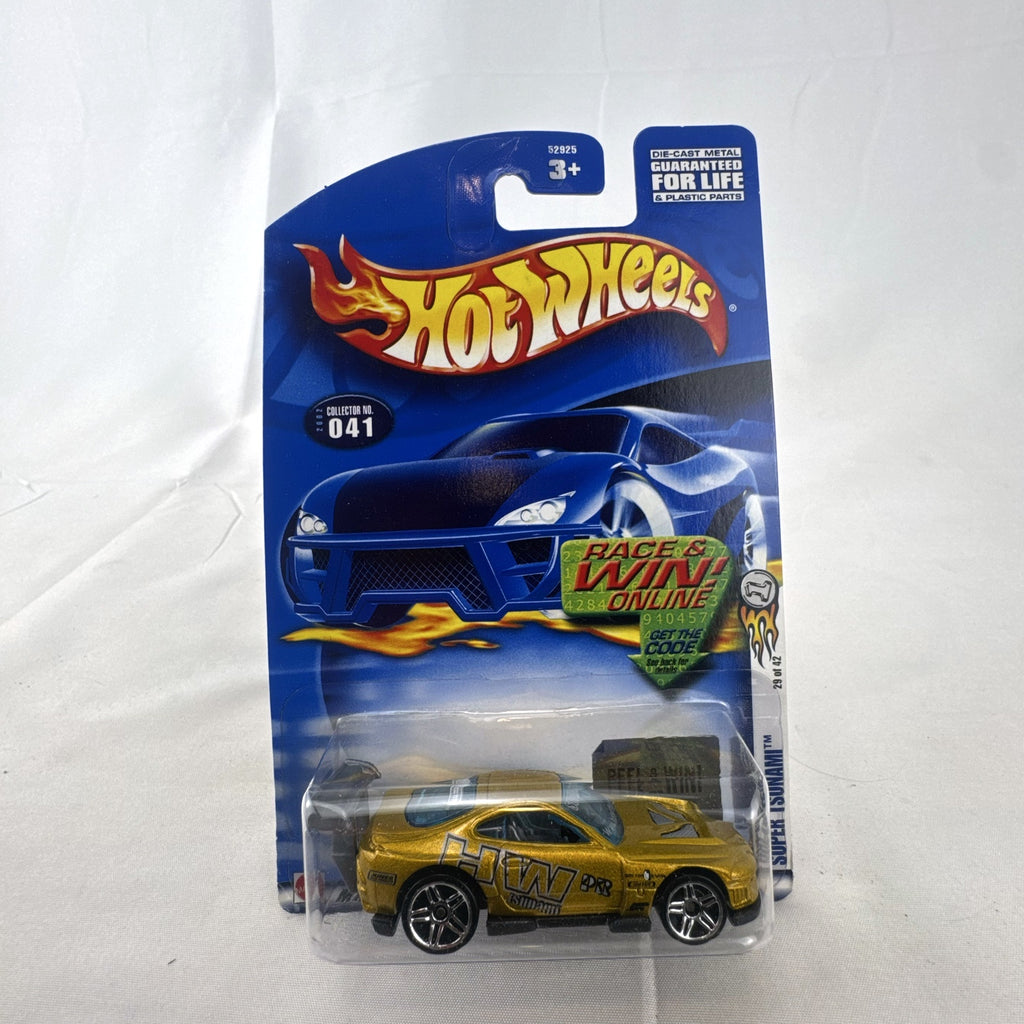 Sealed Hot Wheels 2002 First Editions Super Tsunami 1:64 diecast car in metallic gold on original card