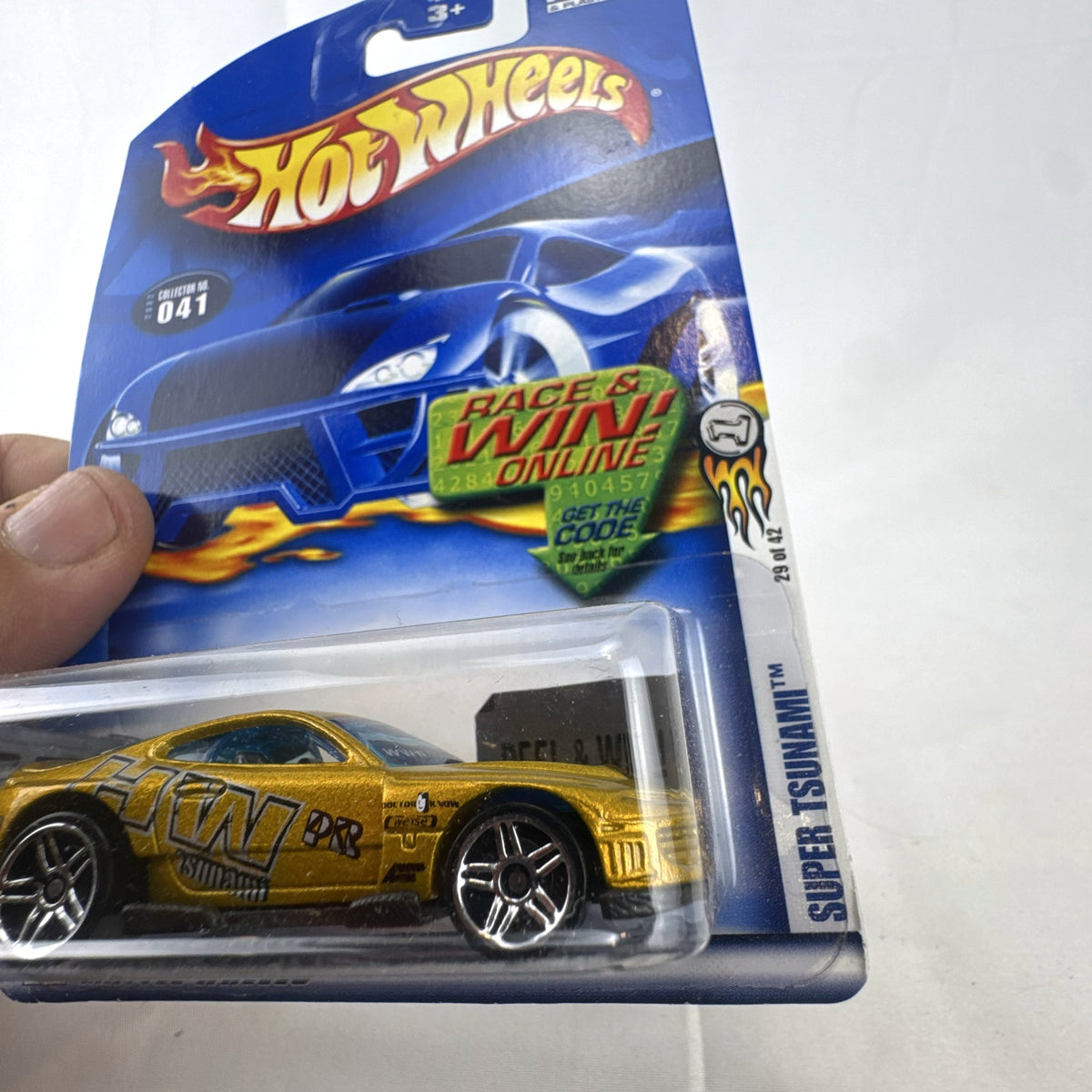 Sealed Hot Wheels 2002 First Editions Super Tsunami 1:64 diecast car in metallic gold on original card