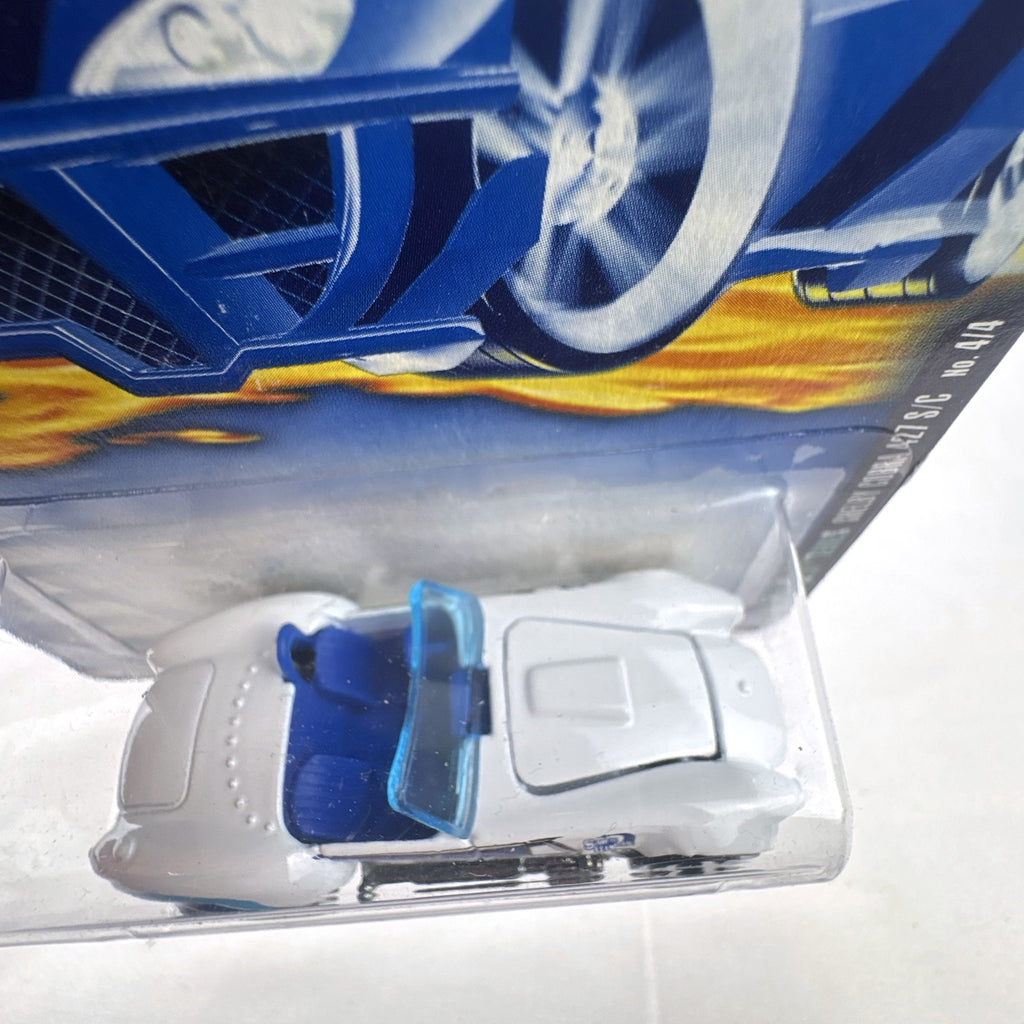 White Hot Wheels 2000 Speed Blaster Series Shelby Cobra 427 S/C diecast car sealed on its original card packaging.