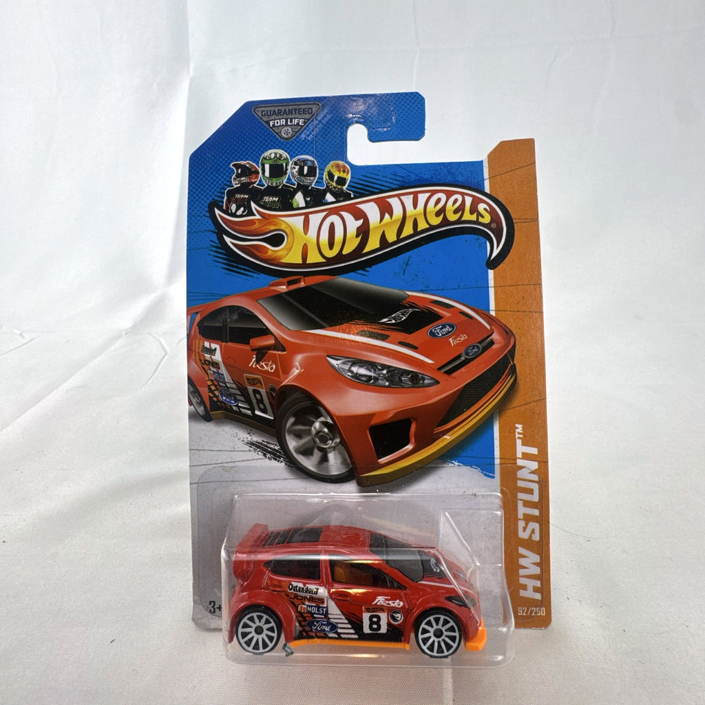 Hot Wheels 2012 Ford Fiesta Road Rally diecast car in red, 1:64 scale on original blister card