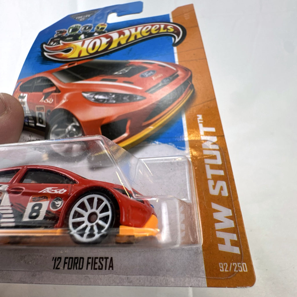 Hot Wheels 2012 Ford Fiesta Road Rally diecast car in red, 1:64 scale on original blister card