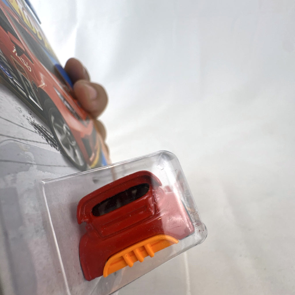 Hot Wheels 2012 Ford Fiesta Road Rally diecast car in red, 1:64 scale on original blister card