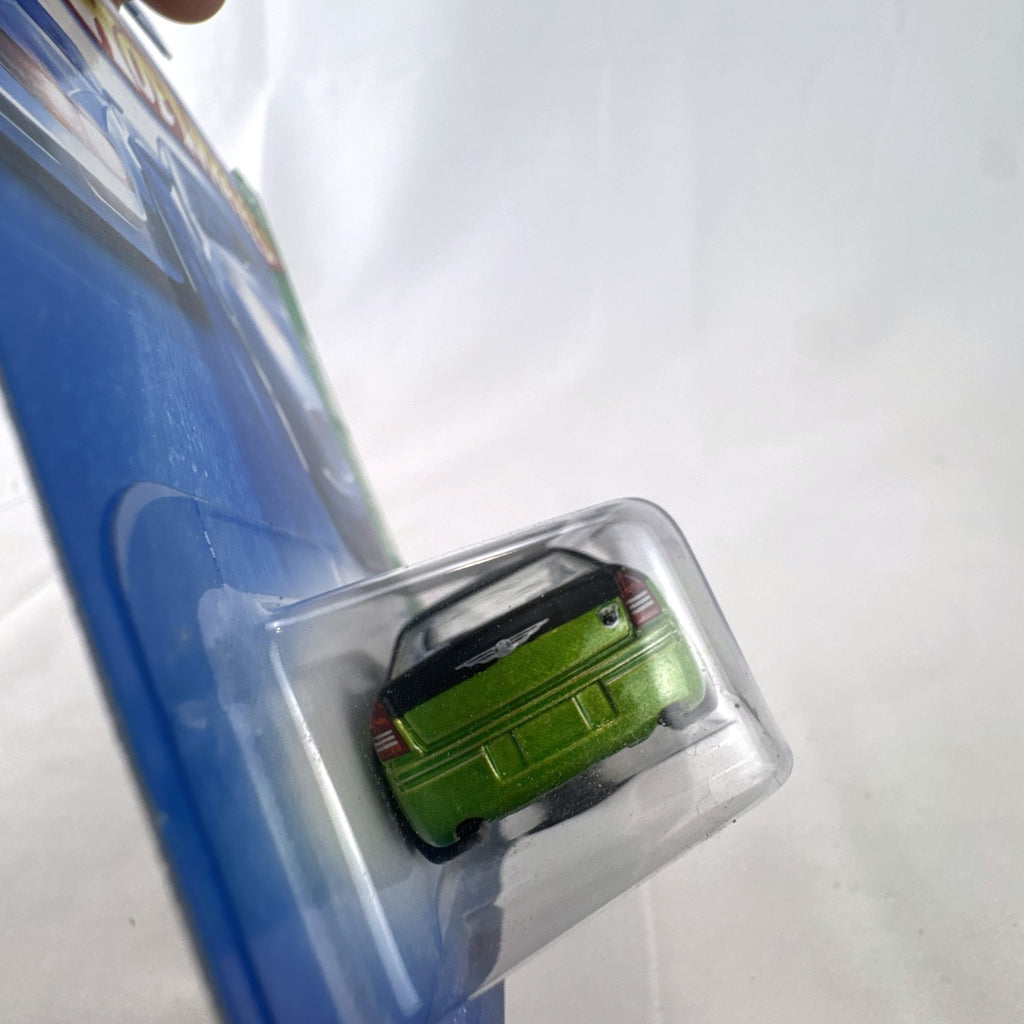 Hot Wheels 1:64 scale 2005 Chrysler 300C Treasure Hunt diecast car in metallic green, new in original blister pack.
