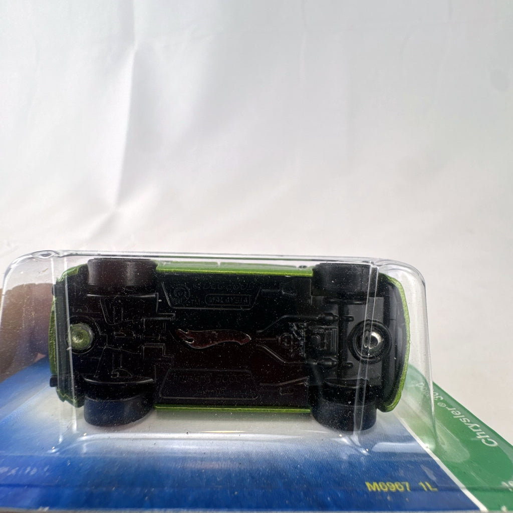 Hot Wheels 1:64 scale 2005 Chrysler 300C Treasure Hunt diecast car in metallic green, new in original blister pack.