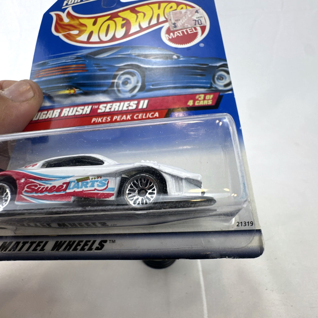 Hot Wheels 1:64 scale Toyota Pikes Peak Celica in white with SweeTARTS graphics in original packaging