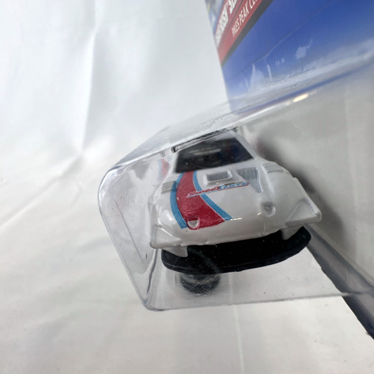 Hot Wheels 1:64 scale Toyota Pikes Peak Celica in white with SweeTARTS graphics in original packaging