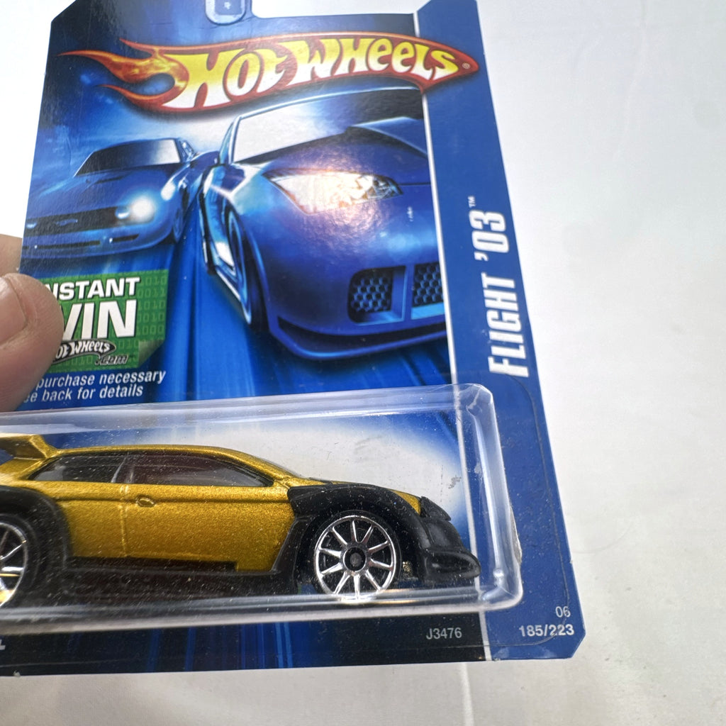 Hot Wheels 2007 All Stars Flight '03 diecast car in metallic gold, packaged on original card
