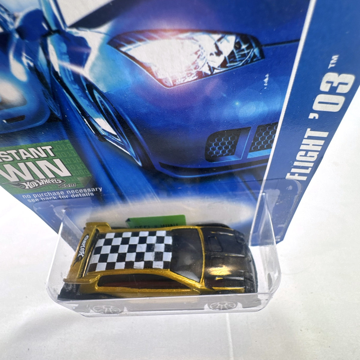 Hot Wheels 2007 All Stars Flight '03 diecast car in metallic gold, packaged on original card