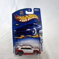 Sealed 2003 Hot Wheels First Editions Flight '03 diecast car in white with red flame graphics on original card