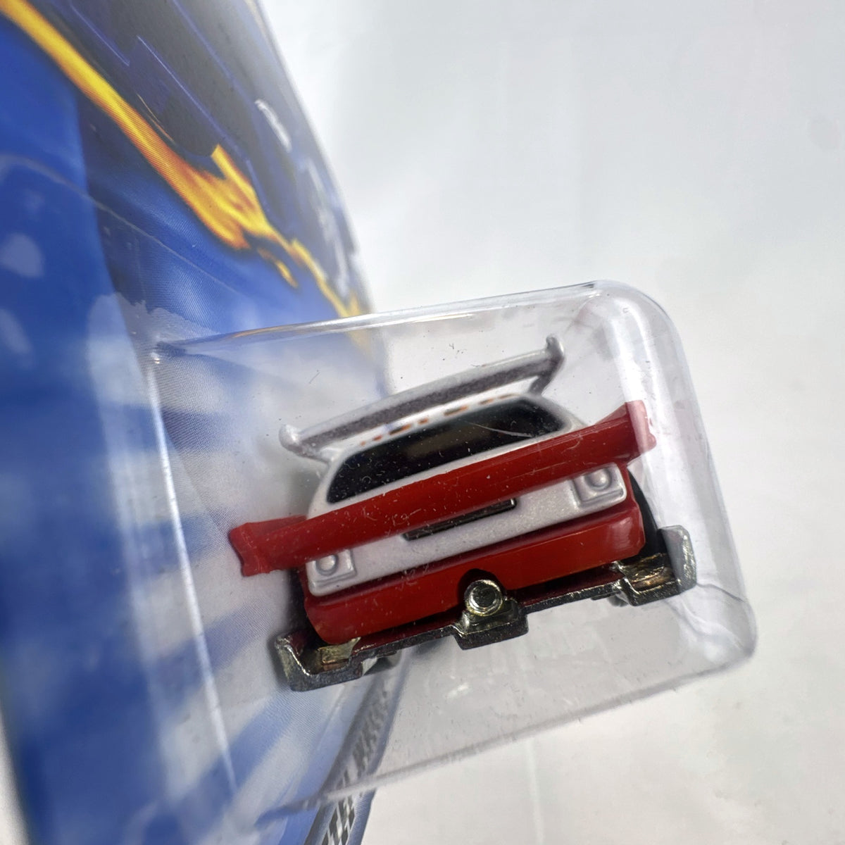 Sealed 2003 Hot Wheels First Editions Flight '03 diecast car in white with red flame graphics on original card
