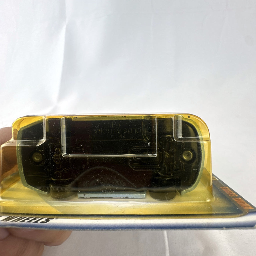 Hot Wheels 2001 Anime Series Oldsmobile Aurora GTS-1 gold diecast car in original blister package