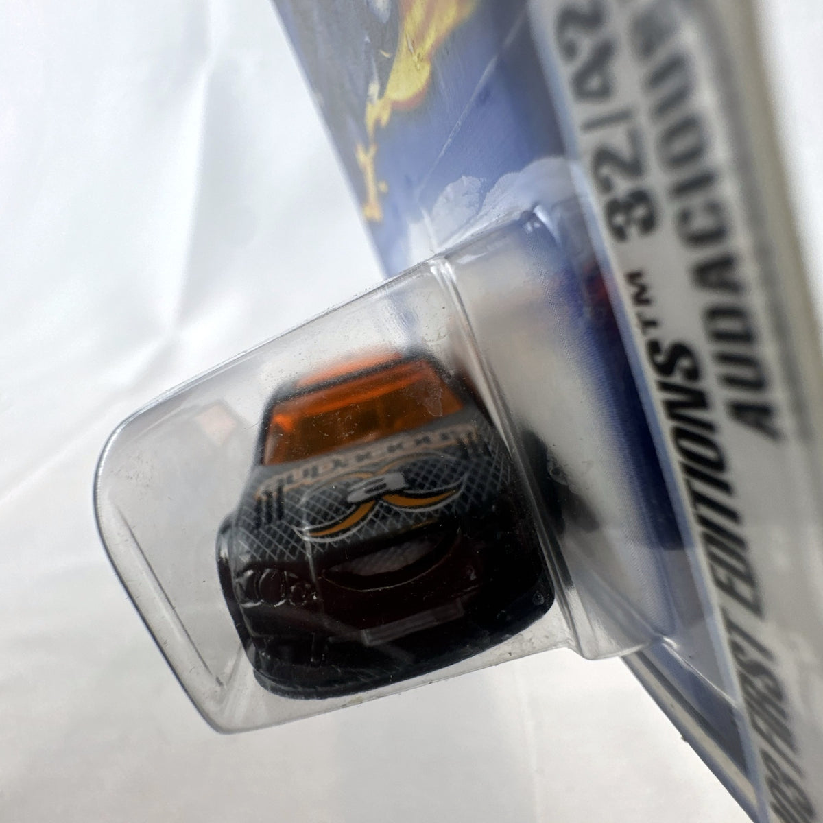 Hot Wheels 2003 First Editions Audacious diecast car in black with orange windows, unopened on card.