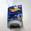 Sealed 2001 Hot Wheels First Editions Hooligan 1:64 diecast car in black with red flame graphics.
