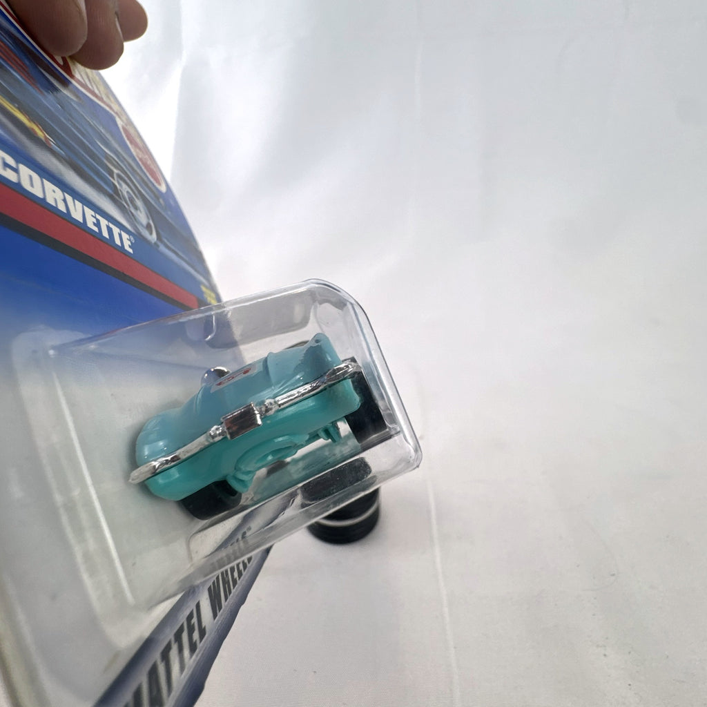 Hot Wheels 1958 Chevrolet Corvette 1:64 scale diecast car in light blue on sealed blue card packaging
