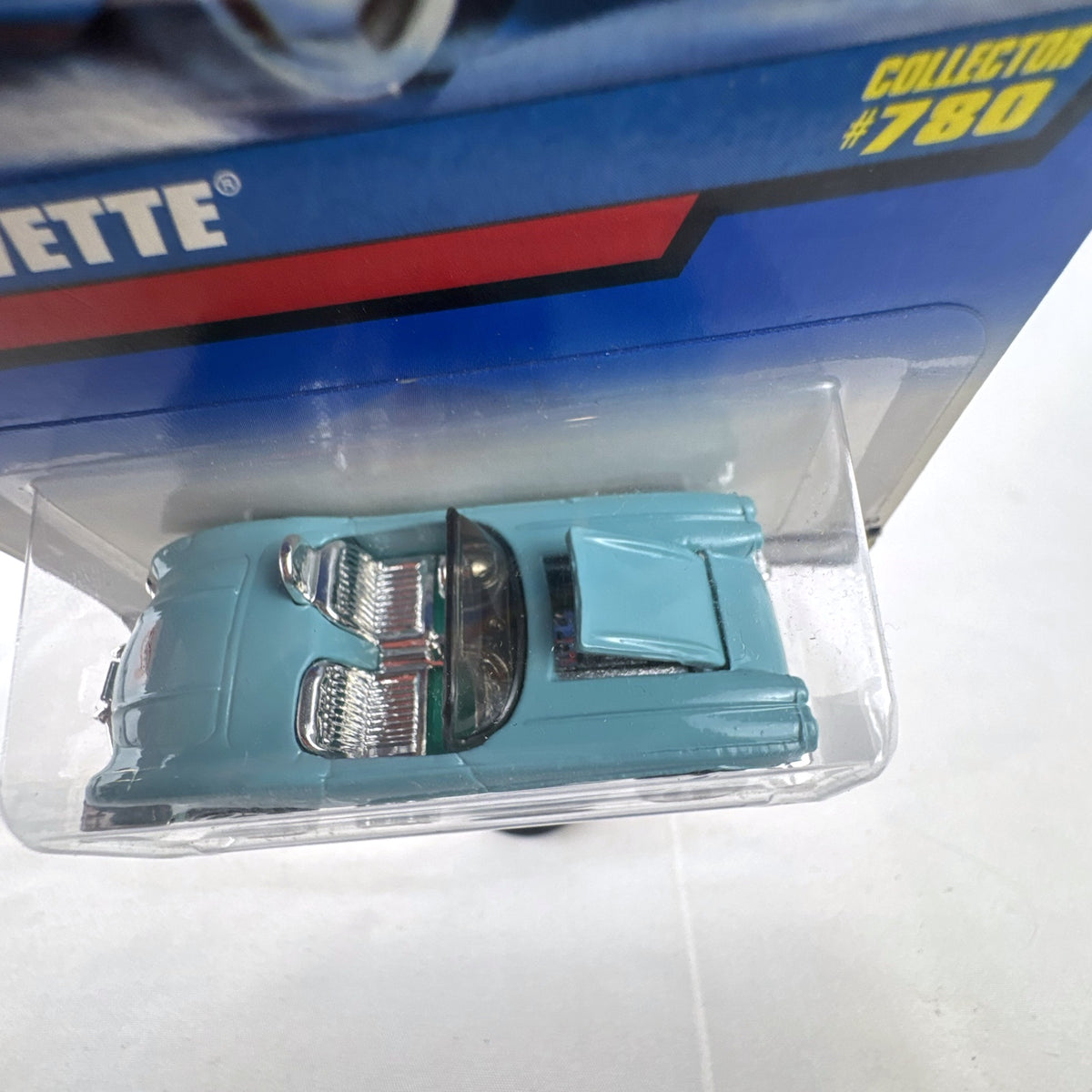 Hot Wheels 1958 Chevrolet Corvette 1:64 scale diecast car in light blue on sealed blue card packaging
