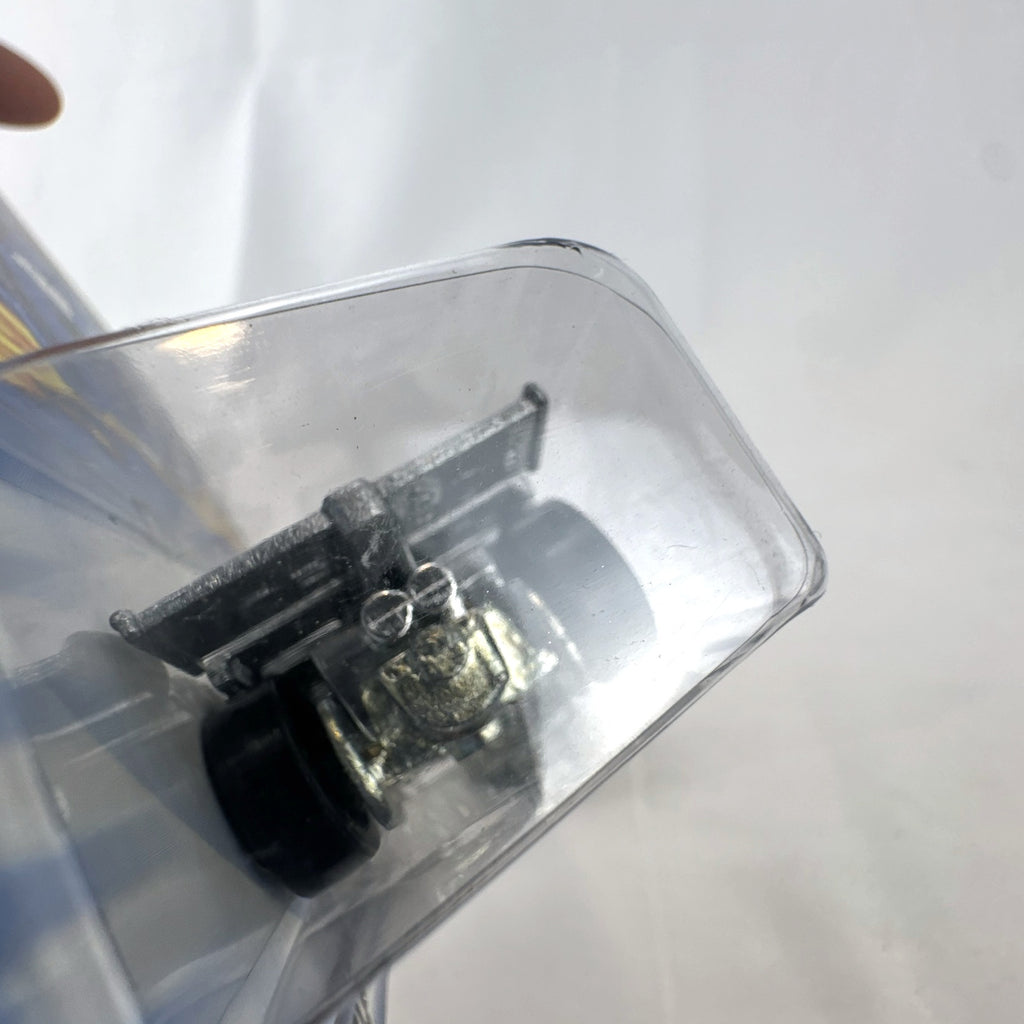 Hot Wheels 2001 Shadow Jet diecast car in chrome silver finish sealed in original card packaging.