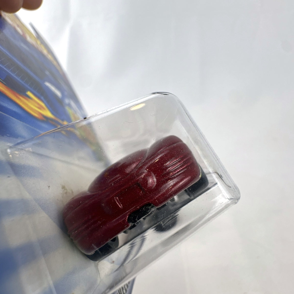 Sealed 2002 Hot Wheels Chrysler Thunderbolt Concept diecast car in dark red with #18 racing graphics on blister card