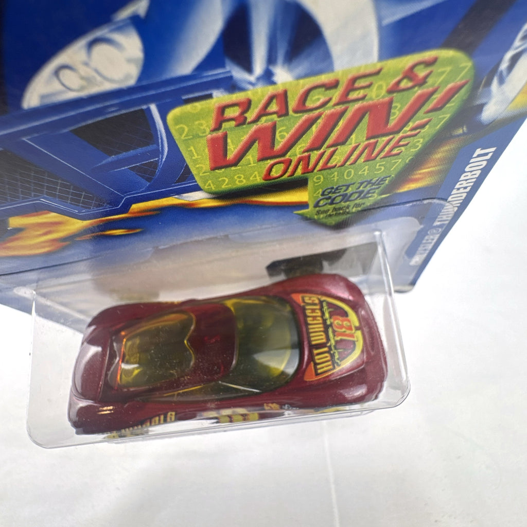Sealed 2002 Hot Wheels Chrysler Thunderbolt Concept diecast car in dark red with #18 racing graphics on blister card