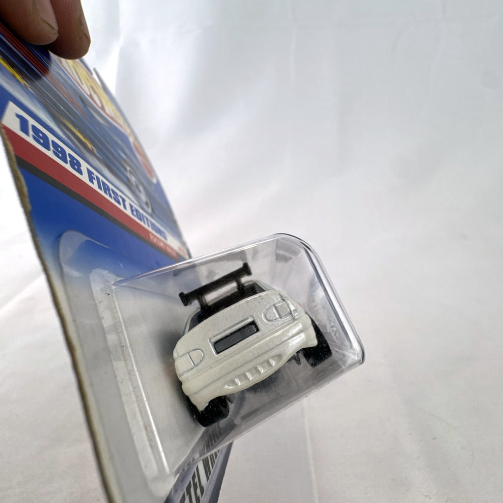 Hot Wheels 1998 First Editions Ford Escort Rally 1:64 scale diecast car in original unopened packaging