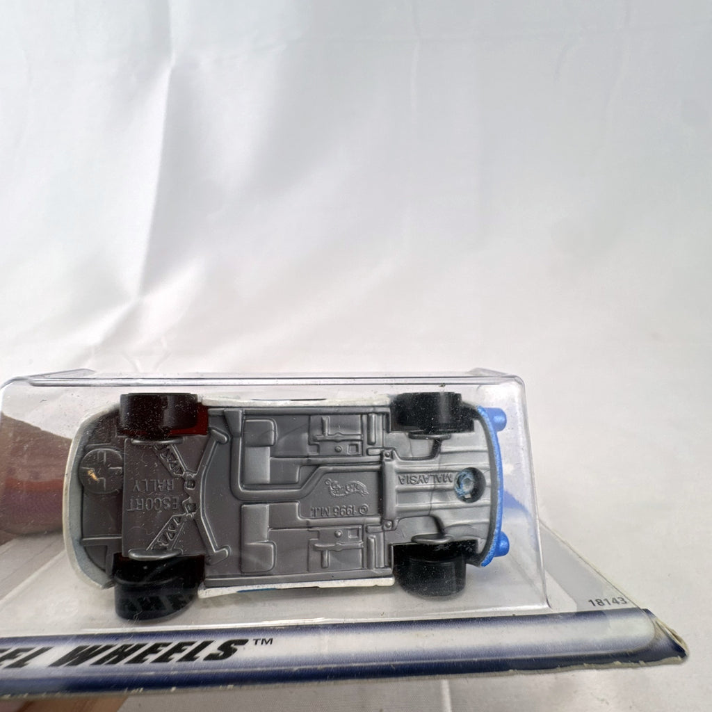 Hot Wheels 1998 First Editions Ford Escort Rally 1:64 scale diecast car in original unopened packaging