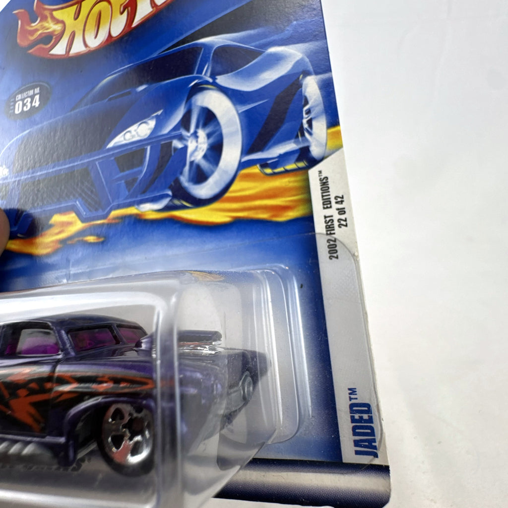 Hot Wheels 2002 First Editions Jaded diecast car in metallic purple with flame graphics in blister card package