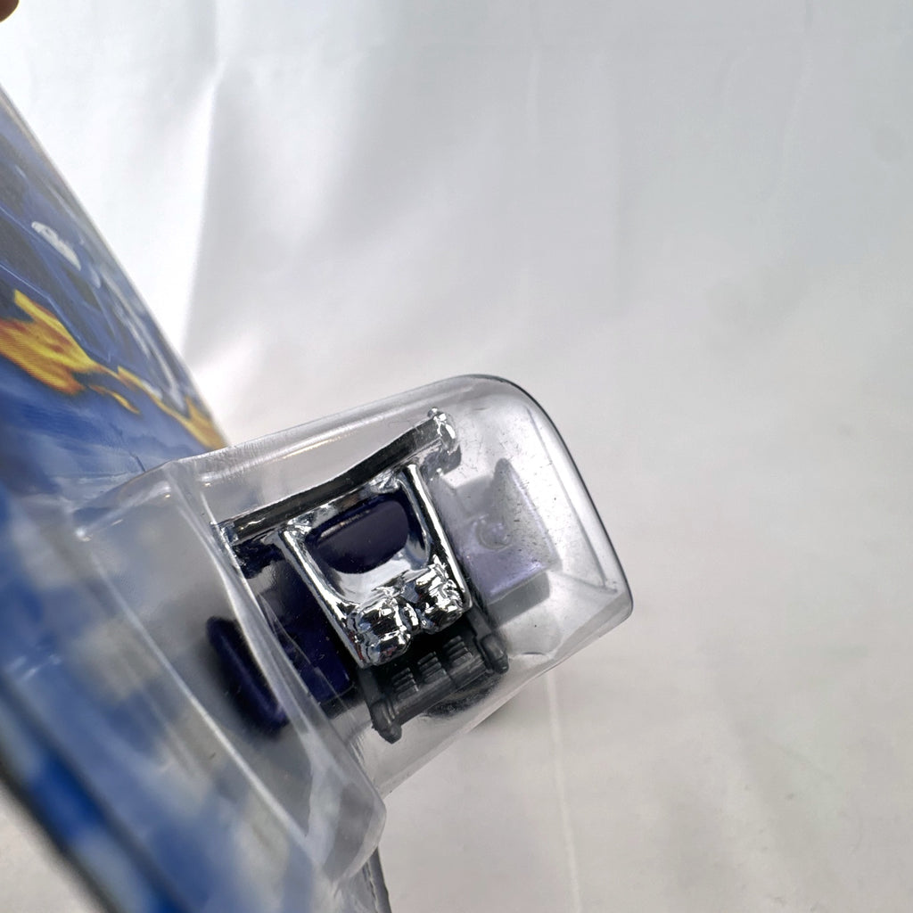 Hot Wheels 2002 First Editions Jaded diecast car in metallic purple with flame graphics in blister card package